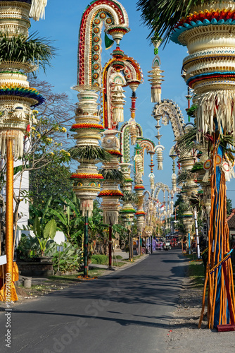 Balinese decorative penjor along the street in Desa Munggu, Badung Bali.