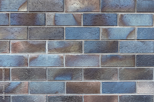Texture of mother-of-pearl clinker tiles.