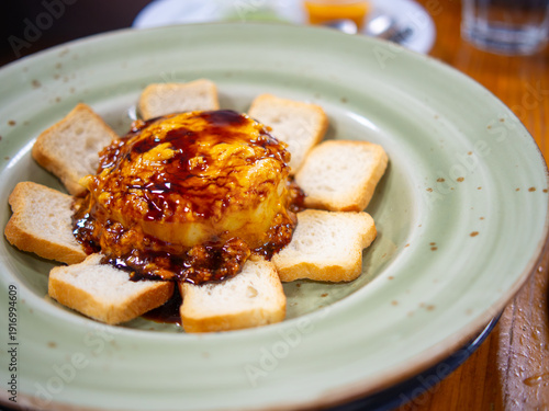 Gourmet sweet potato timbale with traditional Canarian almogrote cheese and a drizzle of palm honey