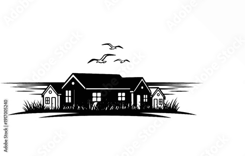 A black and white silhouette of houses by the water with seagulls flying above