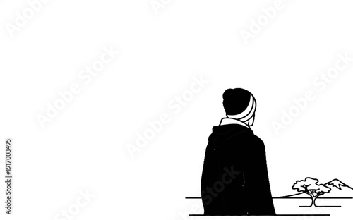 A person in a hooded jacket and beanie gazes towards a sparse landscape