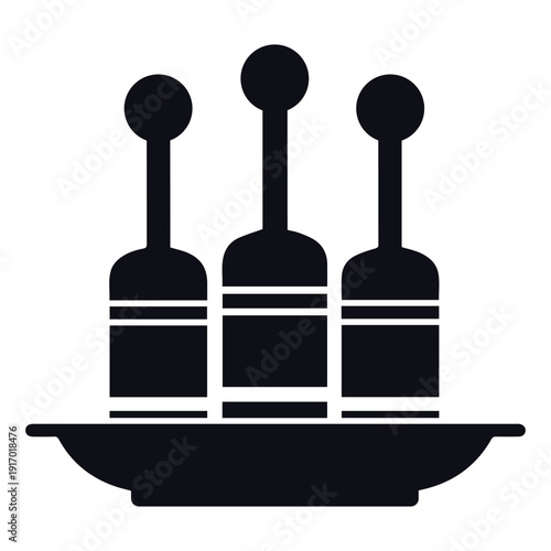 Three stylized bottles on a tray