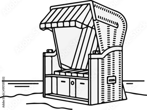 A beach chair with a striped canopy sits on a sandy shore