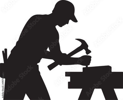 Silhouette of a person hammering on a workbench with tools