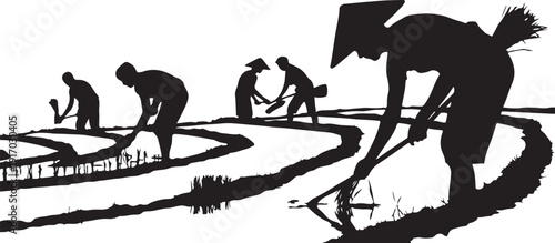 Silhouettes of people working in rice fields with hats