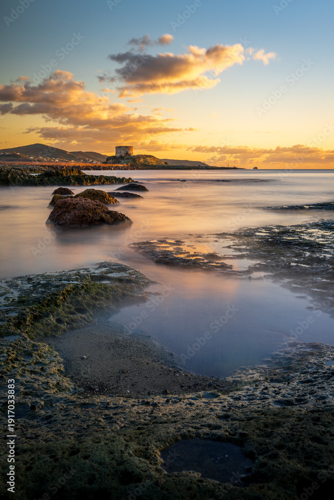 Fototapeta premium A beautiful beach in the sunset