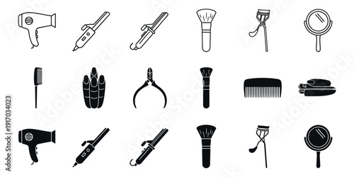 Black and white of various beauty and hair tools hair dryer straightener curling iron makeup brushes
