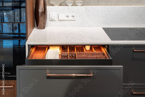Luxury kitchen storage drawer with built-in cutlery organizer