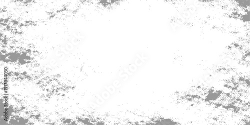 A vintage black grunge background features an old ink splash texture and a dirty paper pattern with a dark paint splat design on a weathered wall surface