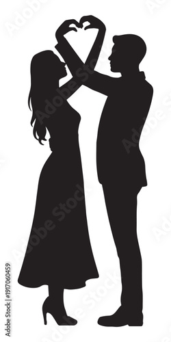 Silhouette of Romantic Couple Forming Heart Shape with Hands for Love