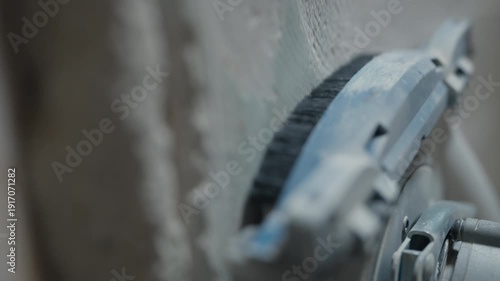 Polishing a wall surface with a power sander