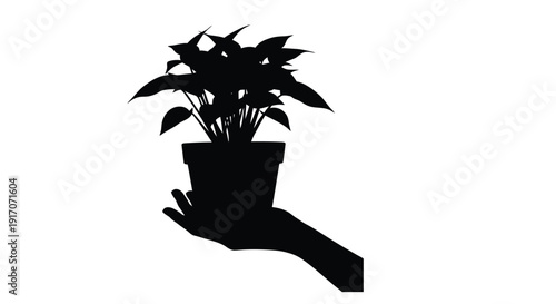 Silhouette of a potted plant held in a hand against a white background