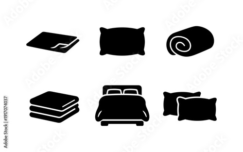 Collection of black icons representing bedding and sleep essentials on a white background