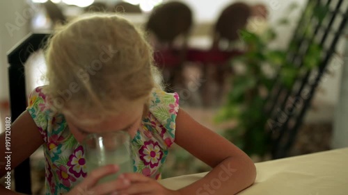 Wallpaper Mural Girl-preschooler drinking juice Torontodigital.ca