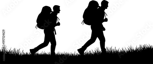 Two hikers with backpacks walking on grass silhouettes Keywords: hiking, backpack, travel, adventure, journey, exploration
