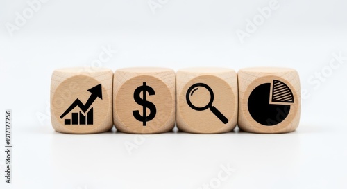 Wooden cubes showing KPI tracking symbols arranged carefully with precise focus and softly blurred white background.