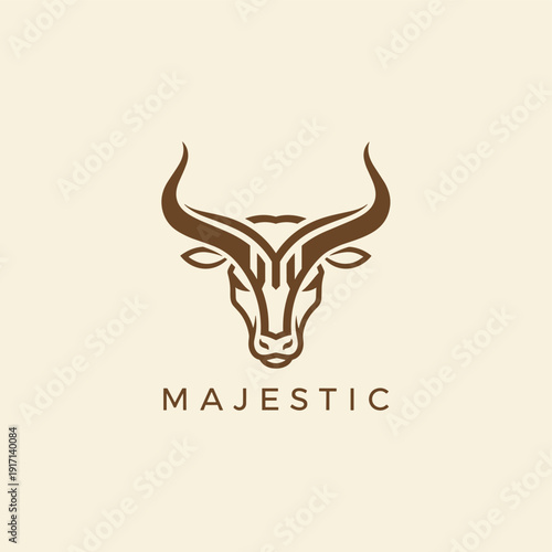 Stylized bull head logo with elegant horns in brown