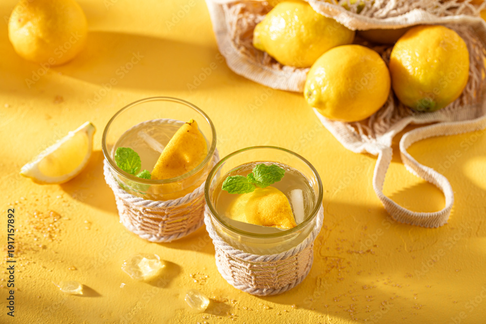 Fototapeta premium Tasty and cold lemonade with mint leaves and citrus.