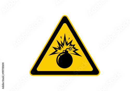Warning sign with exploding bomb icon on yellow triangular background viewed from front