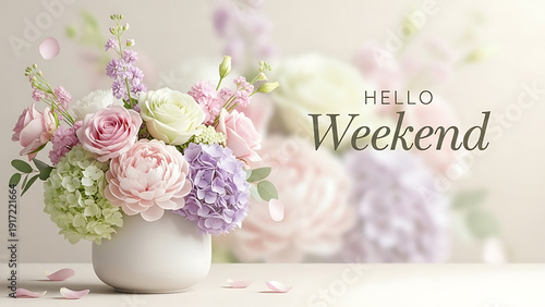 Beautiful flower arrangement in white vase with hello weekend message