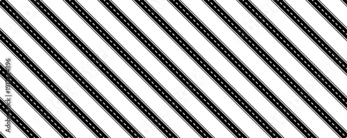 Seamless pattern of multiple straight black roads with white dashed lines in a diagonal layout