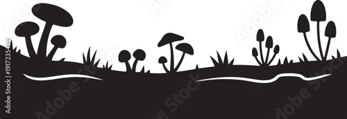 Black and white silhouette of mushrooms and grass on ground