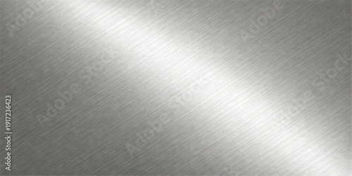 A shiny silver brushed metal texture background features a polished stainless steel plate with a grey metallic aluminum pattern and industrial light reflections on a textured grey surface