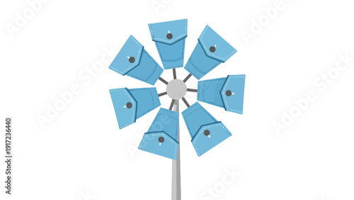 Stylized windmill structure made of blue denim jean pockets on a gray pole