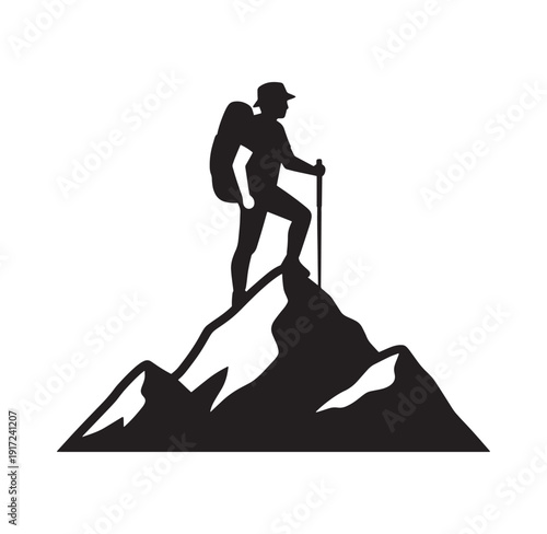 man hiking on mountain peak with backpack and trekking pole
