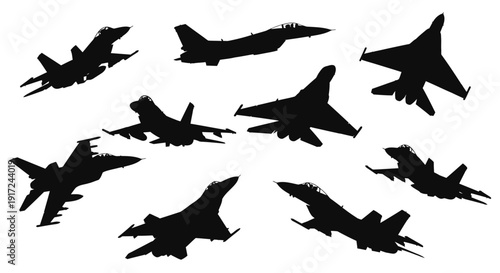 Silhouettes of fighter jets in various flight positions