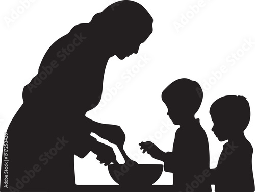 Silhouette of woman and two children cooking together