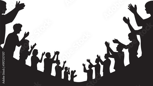 Silhouettes of people raising hands in celebration