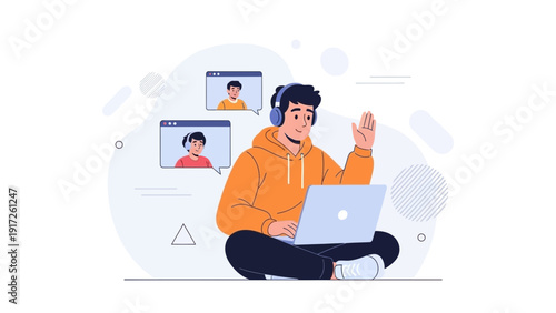 Young man in headphones waving during video conference with friends on laptop