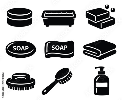 Modern silhouette bathing icons set featuring soap bars, a bathtub, towels, and brushes for personal hygiene