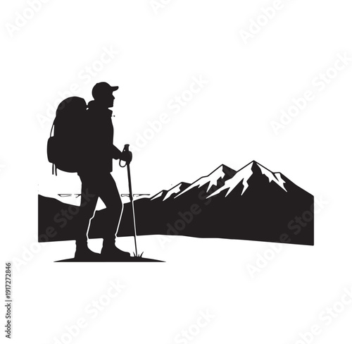 hiker with backpack and trekking poles standing in front of snowy mountain range landscape