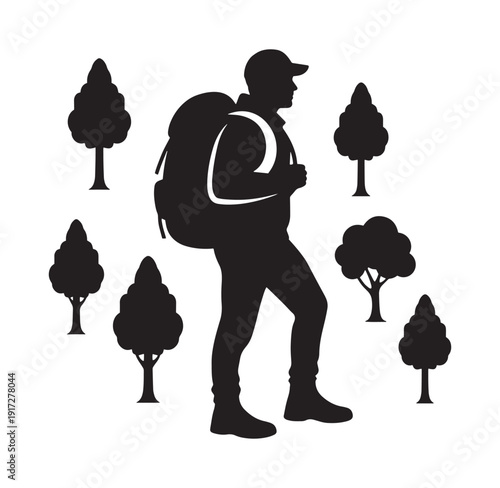 silhouette of a man with a backpack walking among trees in the forest