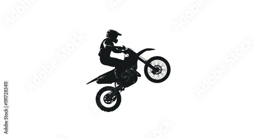Man Riding Dirt Bike in Air.