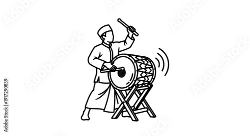 A man playing a large drum with a stick
