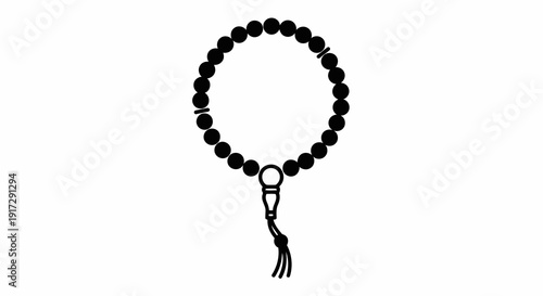 A black beaded bracelet with a tassel