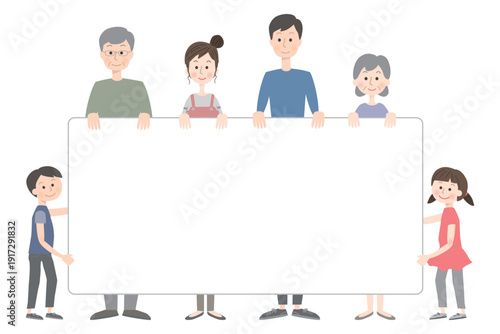 大きなボードを持って立っている三世代家族