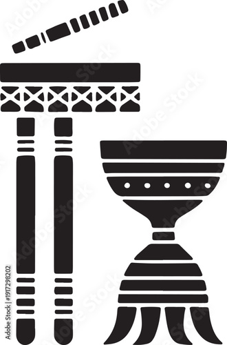 Traditional african percussion instruments featuring wooden drums and sticks for folk rhythm