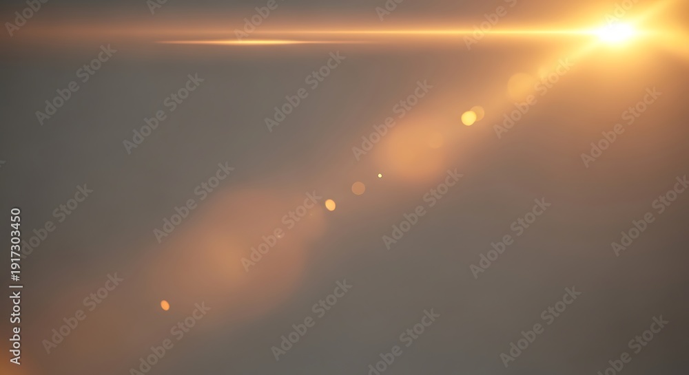 Fototapeta premium A radiant sunset casts a warm glow over a serene landscape with distant lights