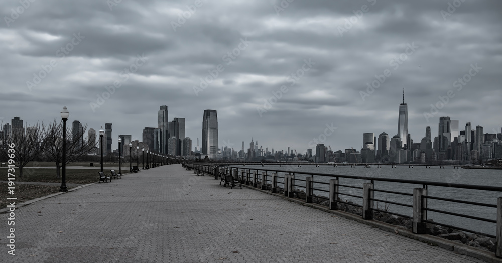 Fototapeta premium NYC with Manhattan in blue dusk tones. New York skyline cityscape. New York iconic view. New York downtown city. New York panorama Manhattan.
