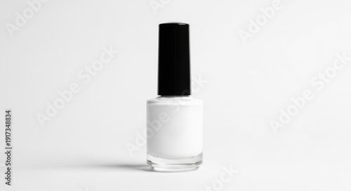 Wallpaper Mural A close-up studio shot of a white nail polish bottle with a black cap, set against white Torontodigital.ca