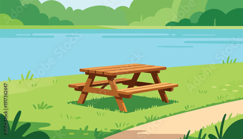 Wooden picnic table on grassy bank beside tranquil blue lake, lush green hills beyond