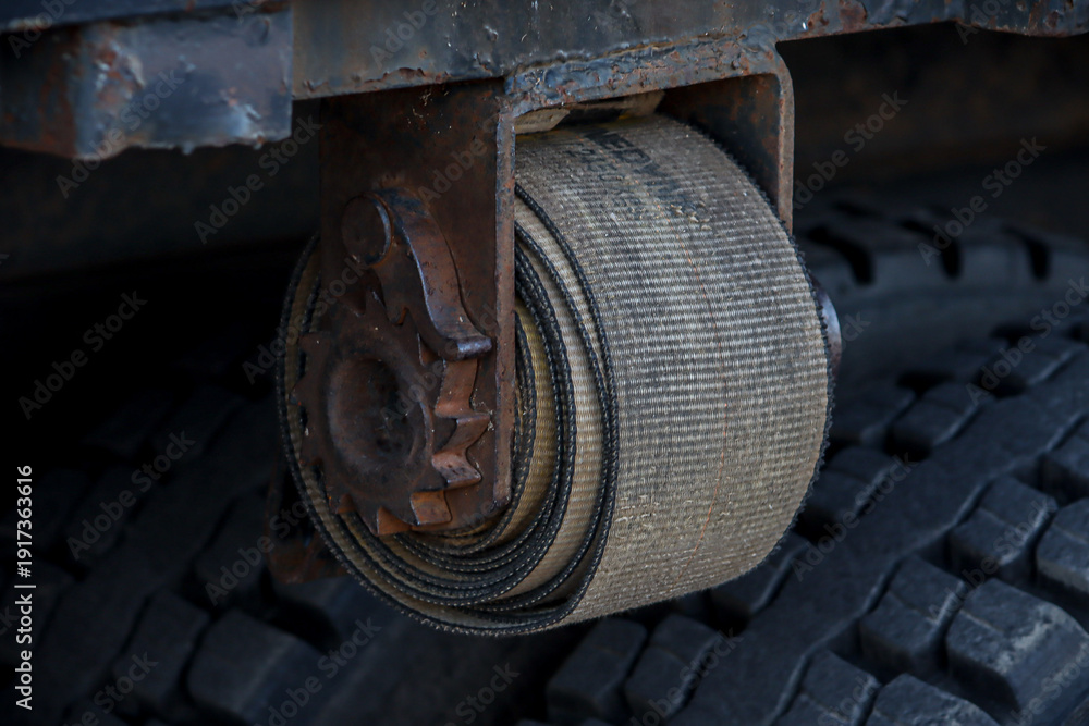Ταπετσαρία Cargo load securement ratchet strap on flatbed truck transportation safety conce