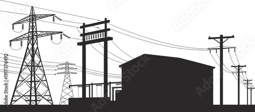 Industrial power line infrastructure with transmission towers and building silhouette power lines electricity