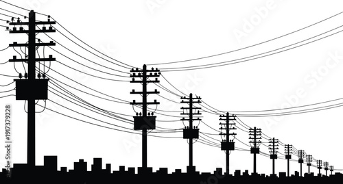 Silhouette of utility poles and power lines stretching across a cityscape black white background