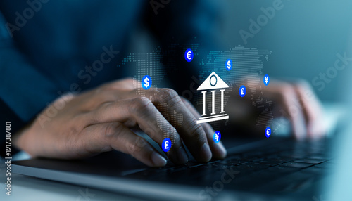 User typing on laptop with global banking interface and multiple currency symbols, international finance, digital payments, online banking, forex transactions and global money transfer.