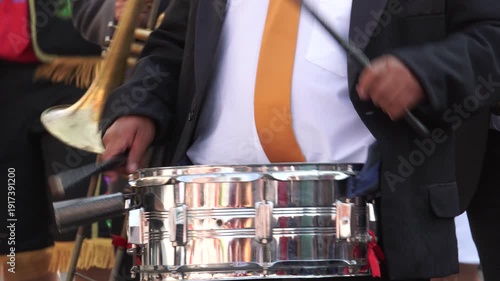 Energetic Mexican Musician Playing Drums at Carnival – Close-Up of Hands, Traditional Festival Performance